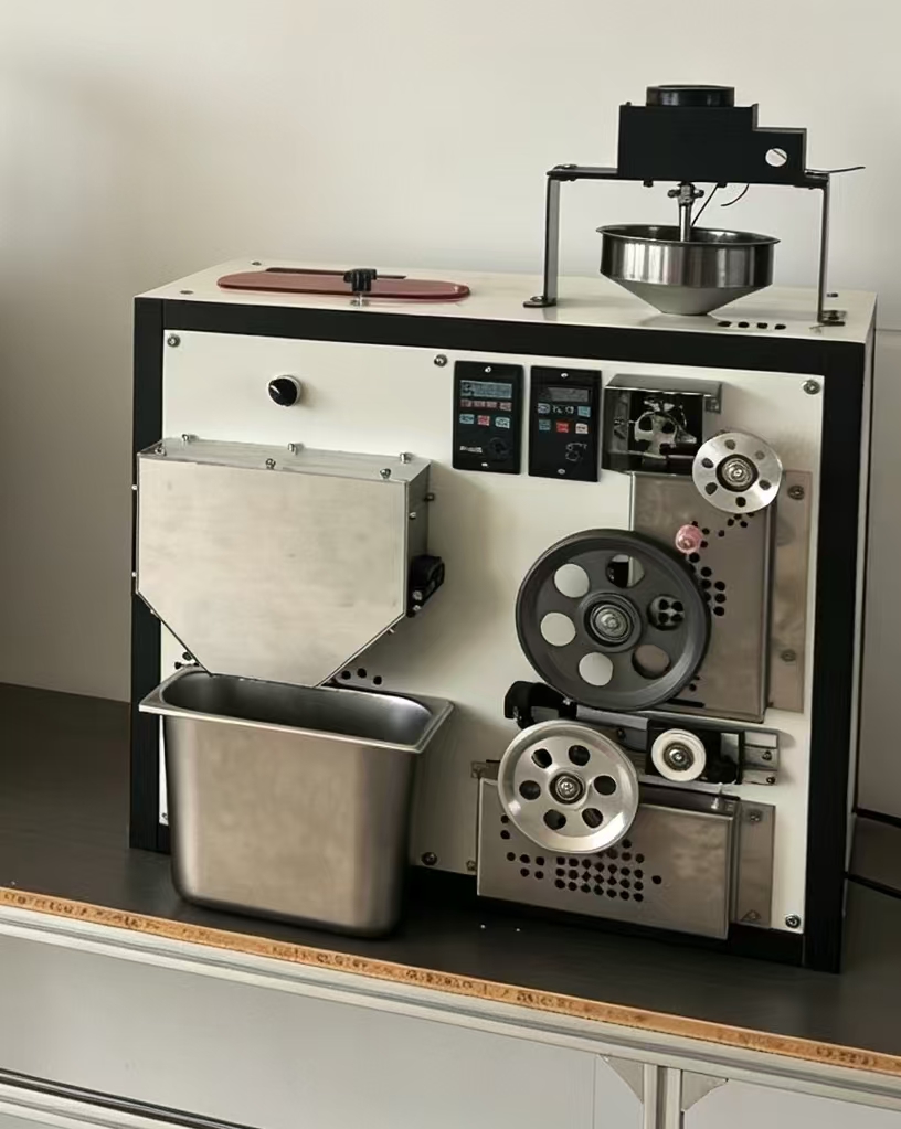 Alternate view of the white desktop pelletizing prototype